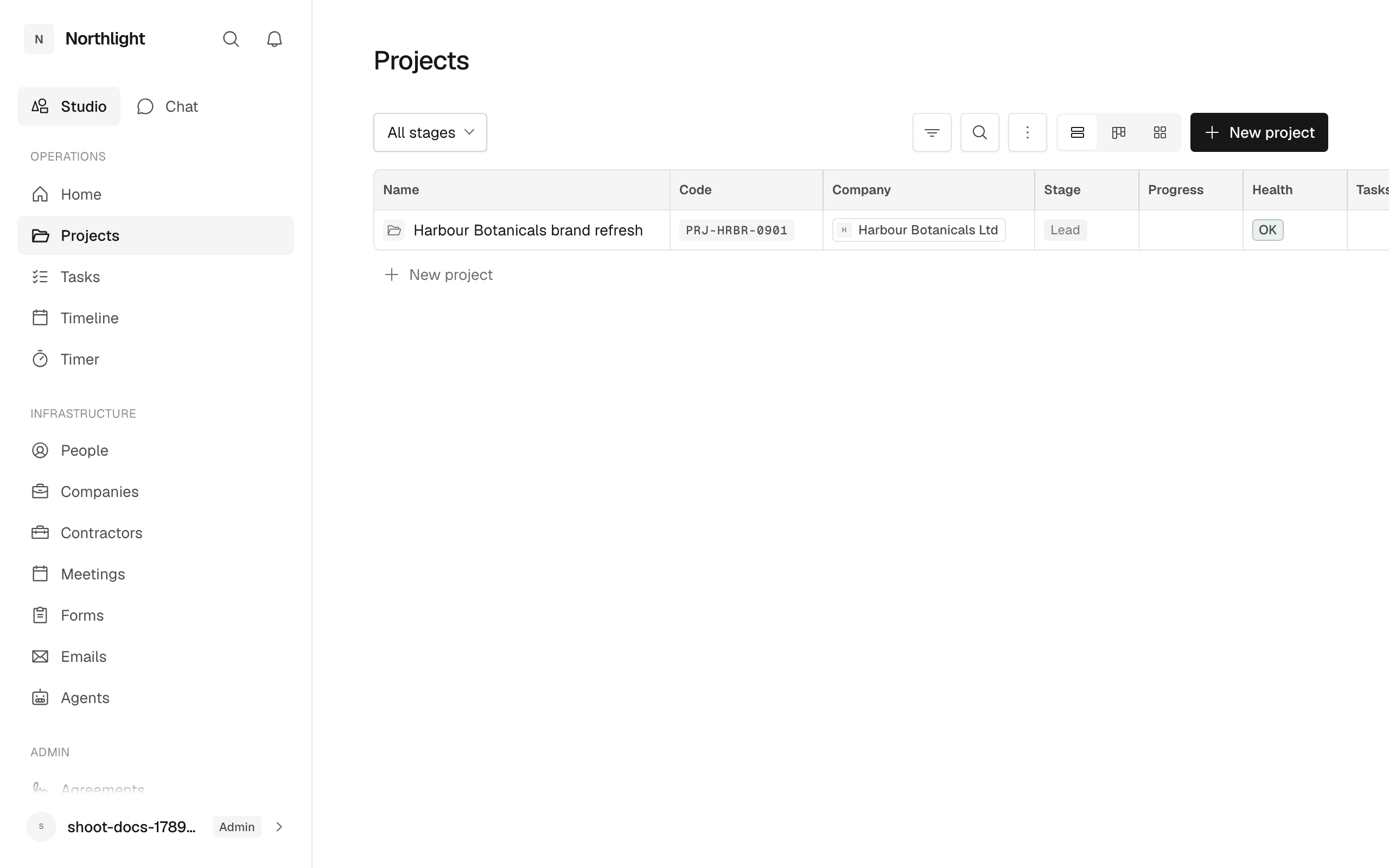 The Projects register in Table view: one row per project with name, code, company, stage and health.